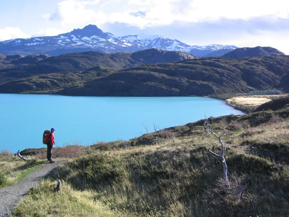 A hiker above Lago Pehoé
